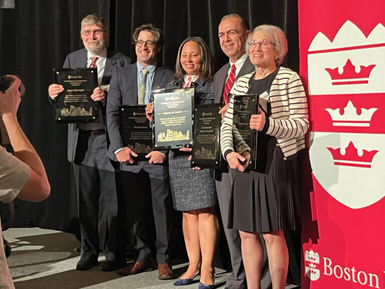 Michael photo holding BBA's Mary K. Ryan Pro Bono Award